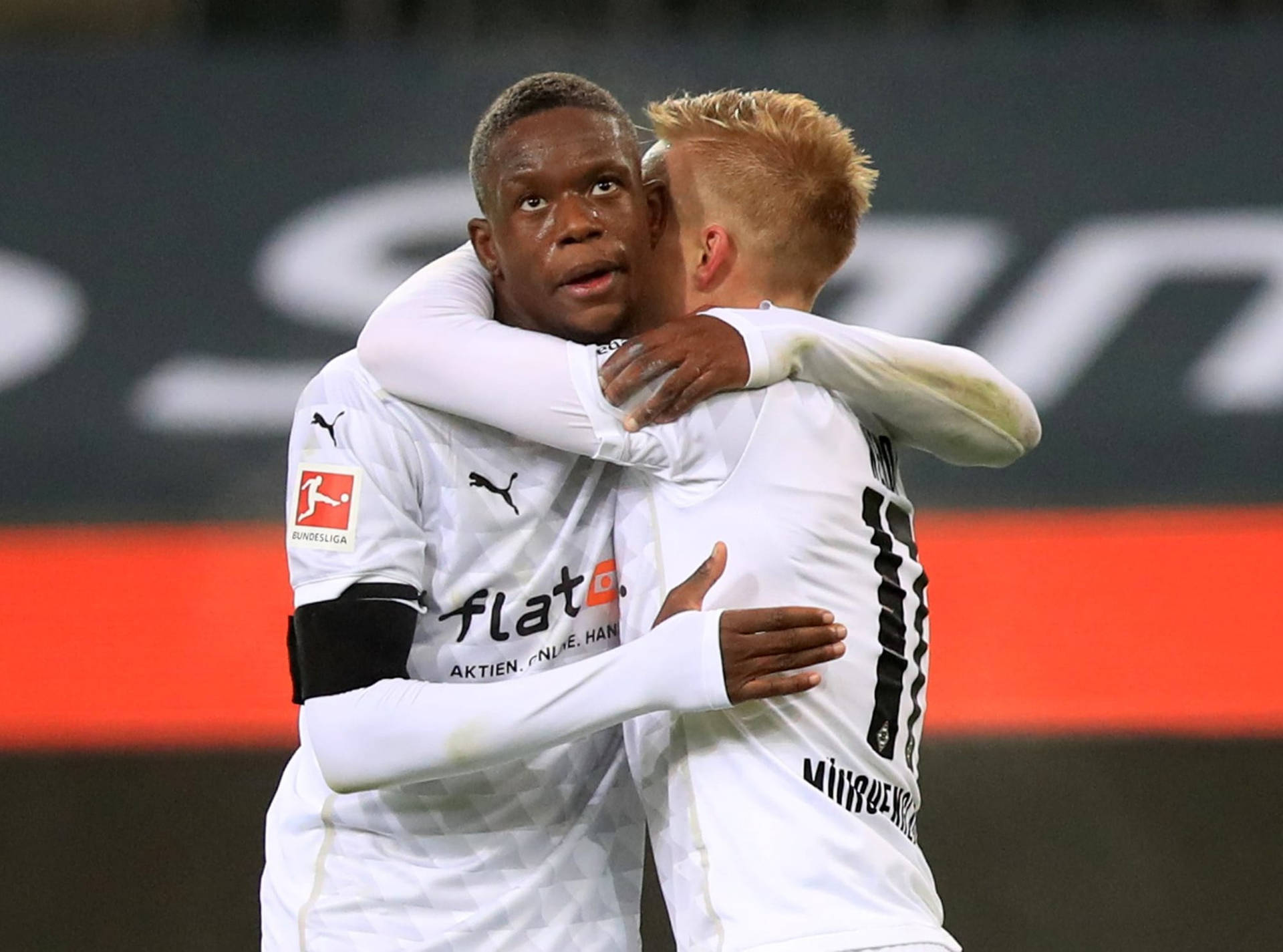 Denis Zakaria Hugging Teammate