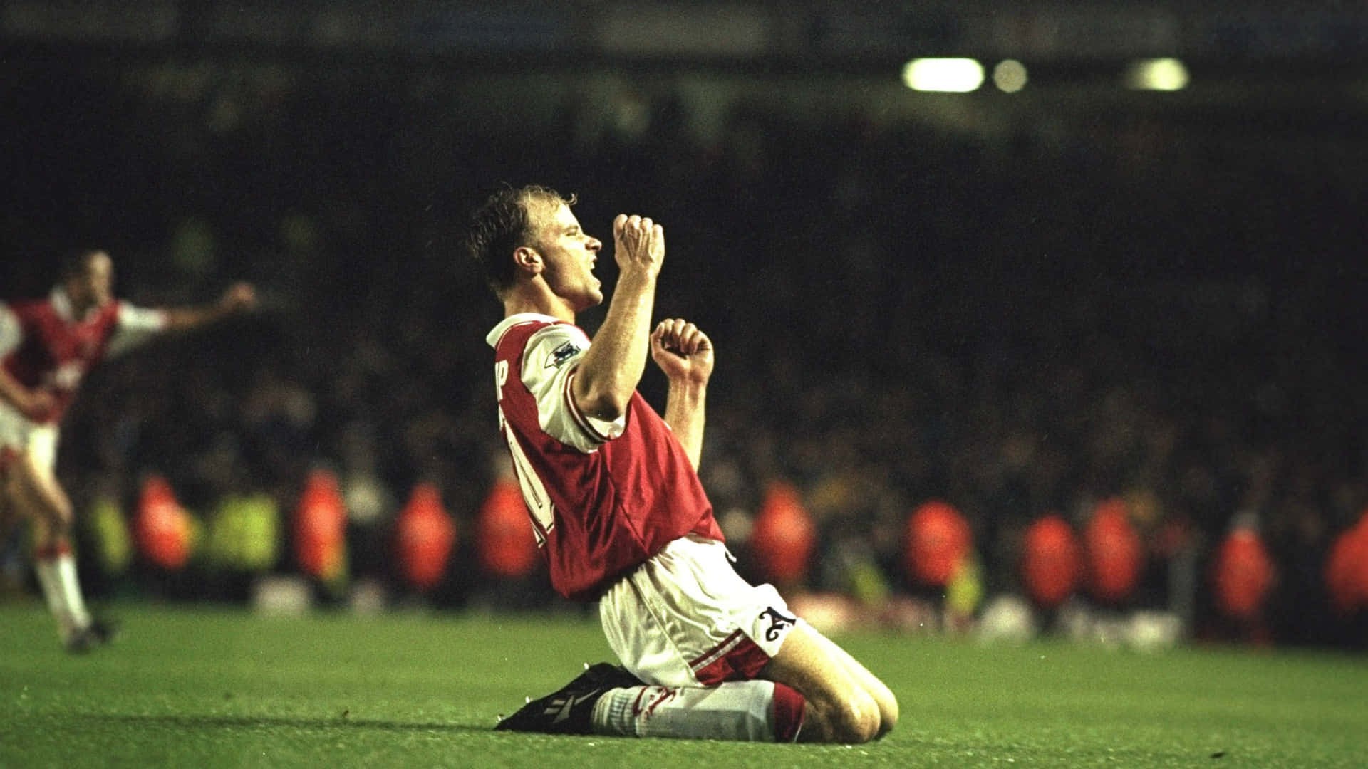 Dennis Bergkamp Arsenal Vs. Tottenham Hotspur Win Background