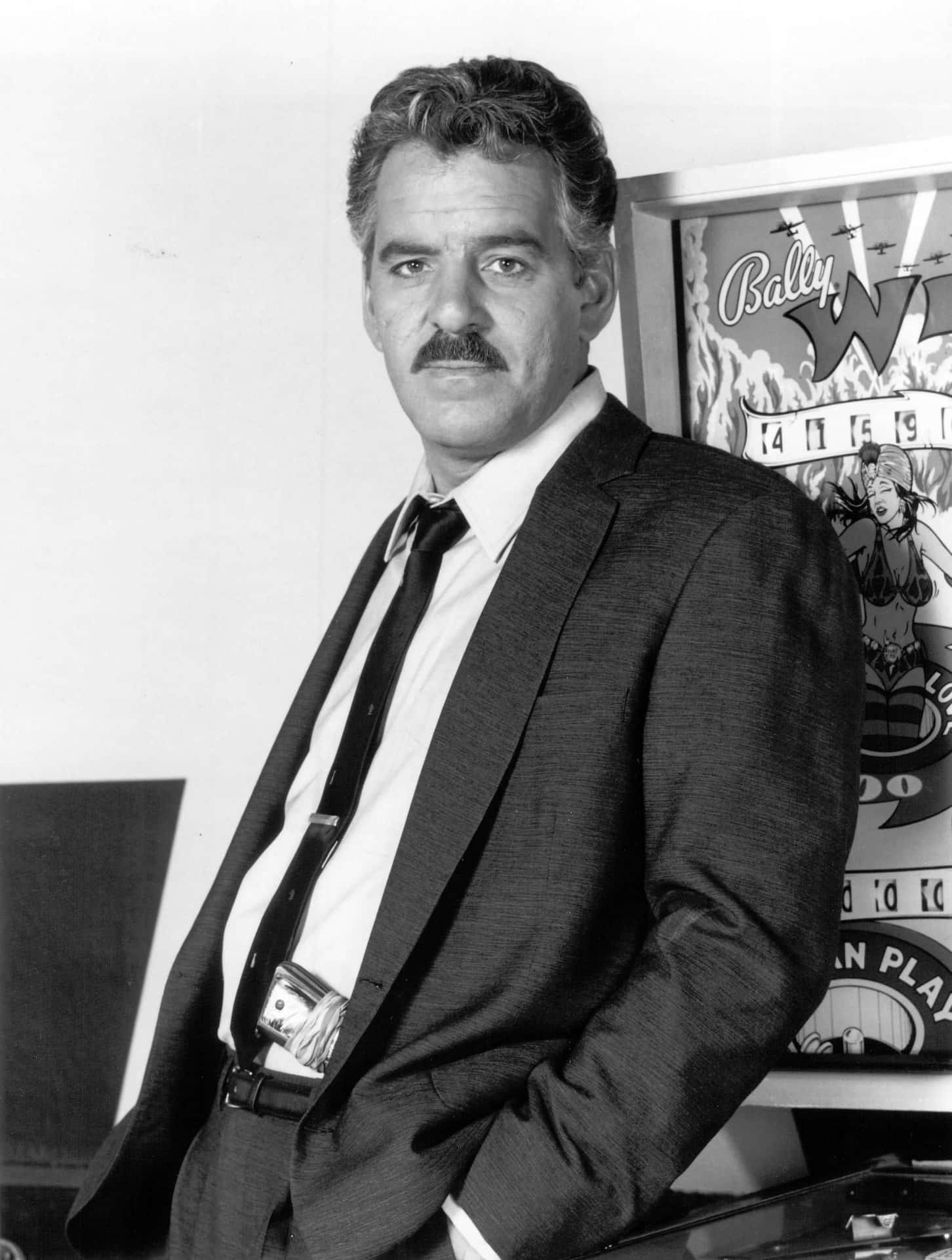 Dennis Farina During An Interview Background