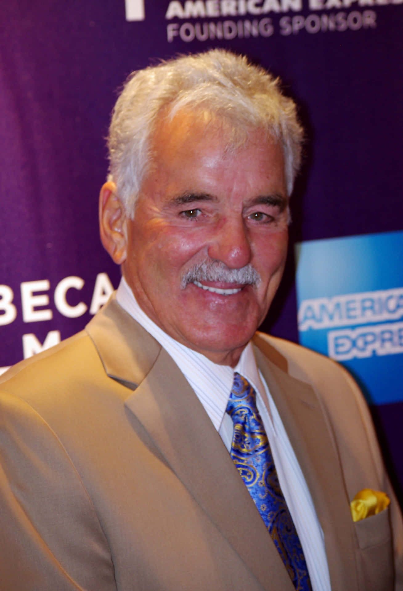 Dennis Farina In A Classic Pose Background