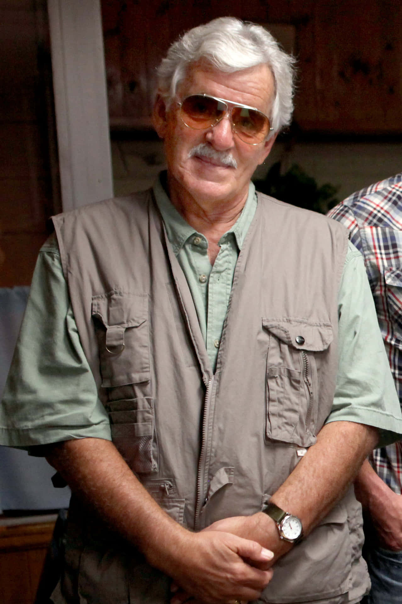Dennis Farina Posing For A Photograph