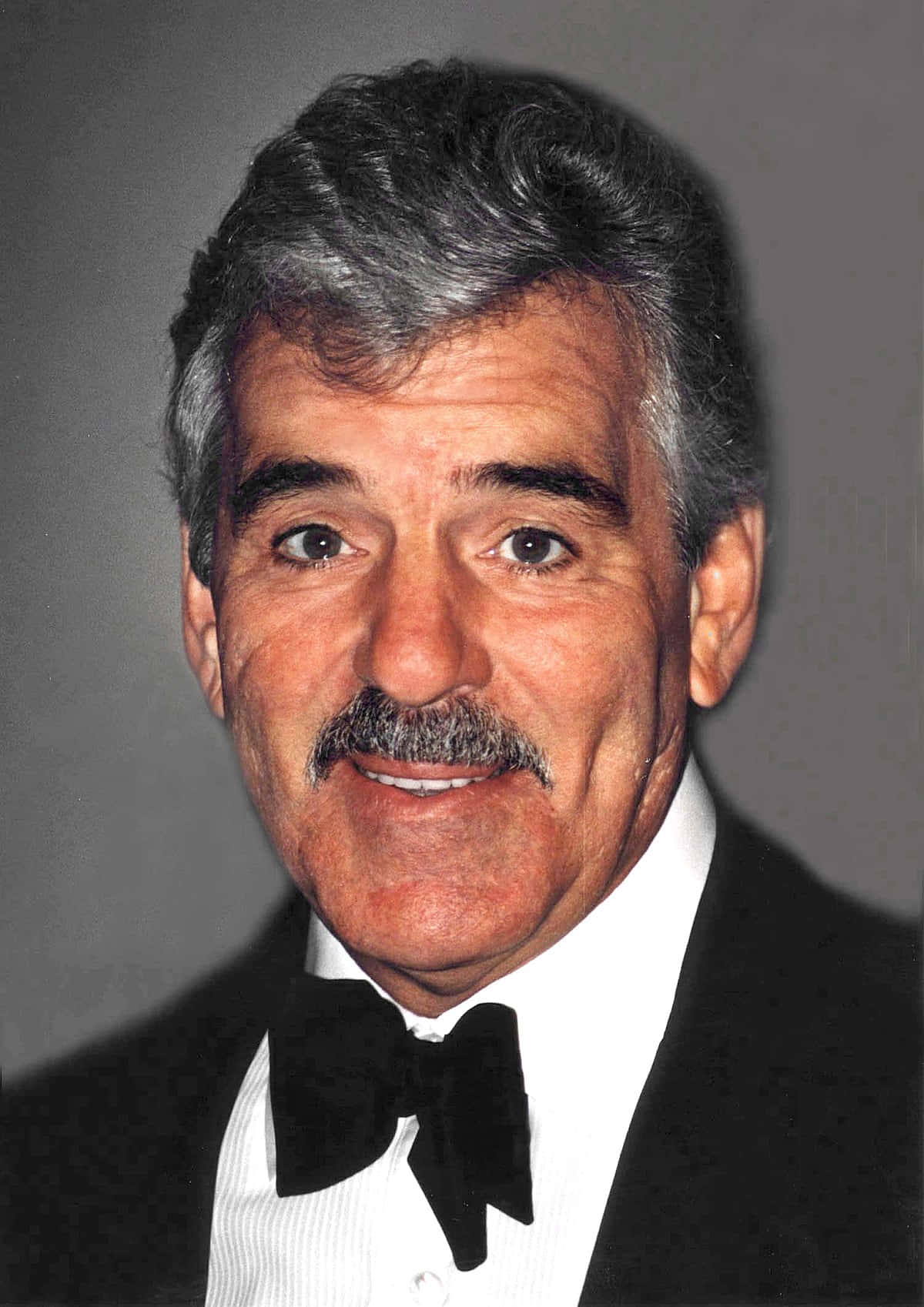 Dennis Farina Posing For A Portrait