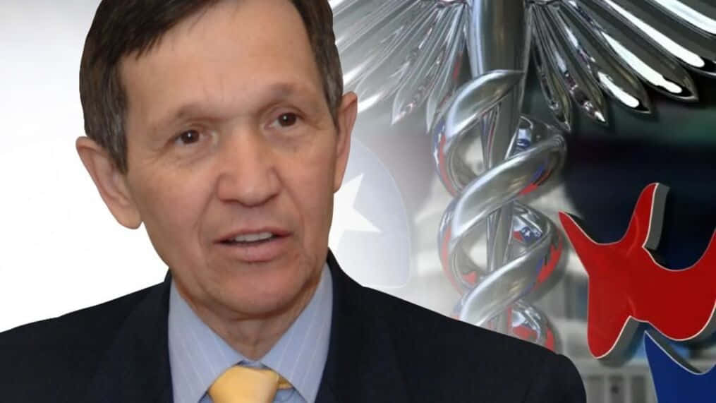 Dennis Kucinich In Suit And Tie Background