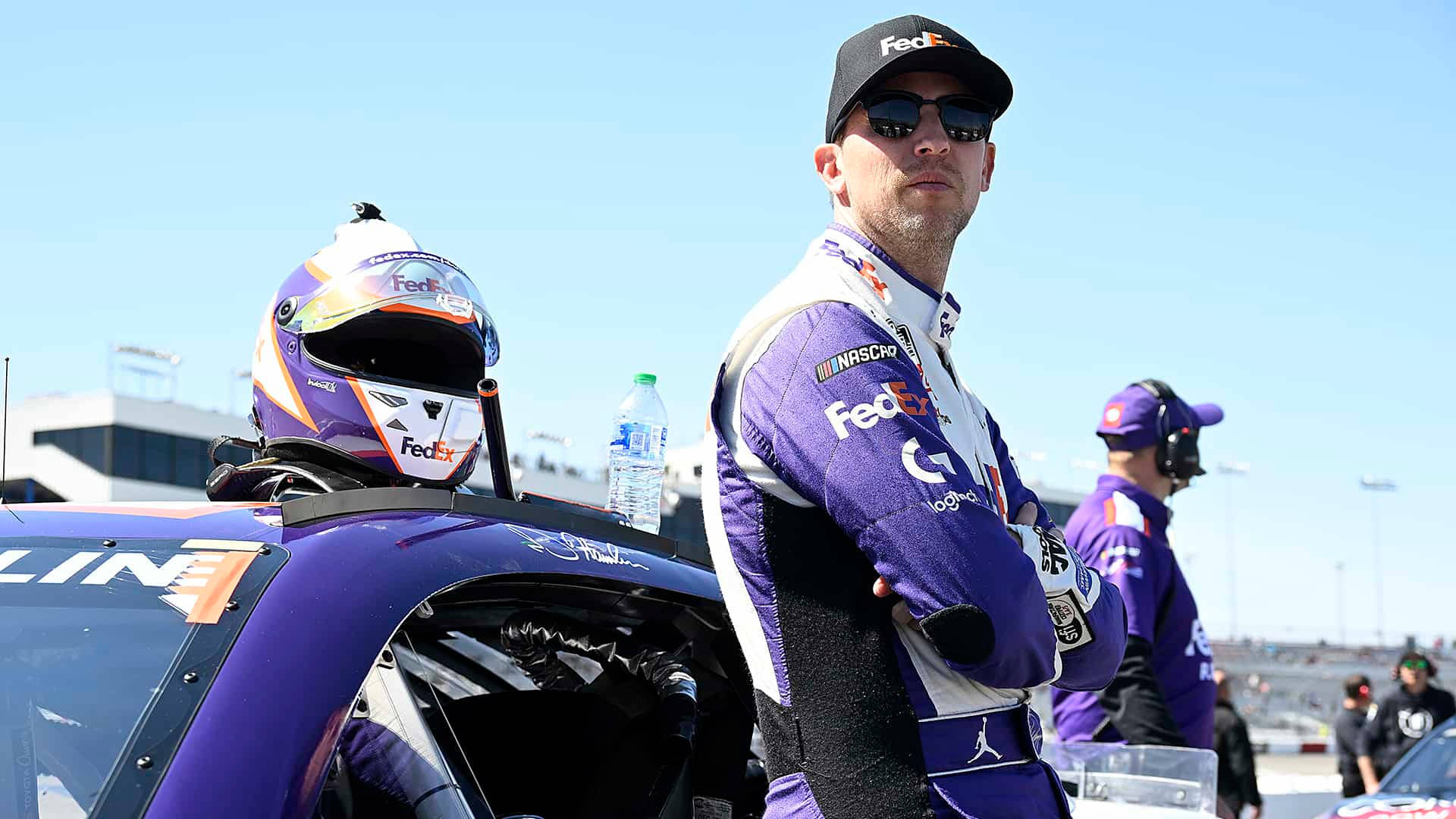 Denny Hamlin Leaning Against Car