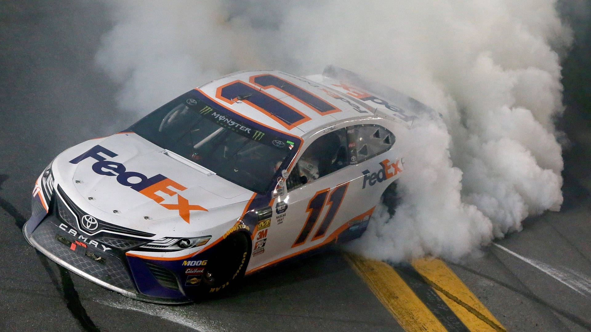 Denny Hamlin’s Car Smoking Background