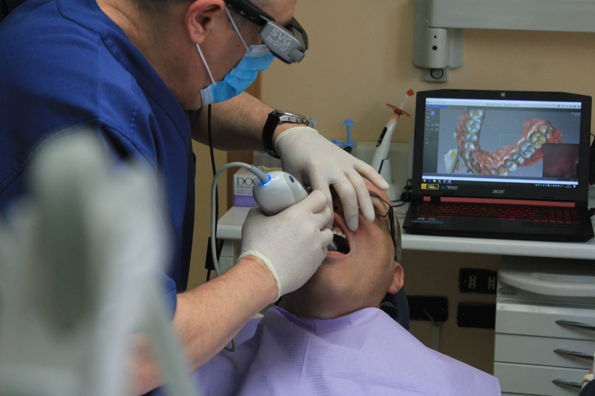 Dentist Viewing Patient’s Teeth Dentistry