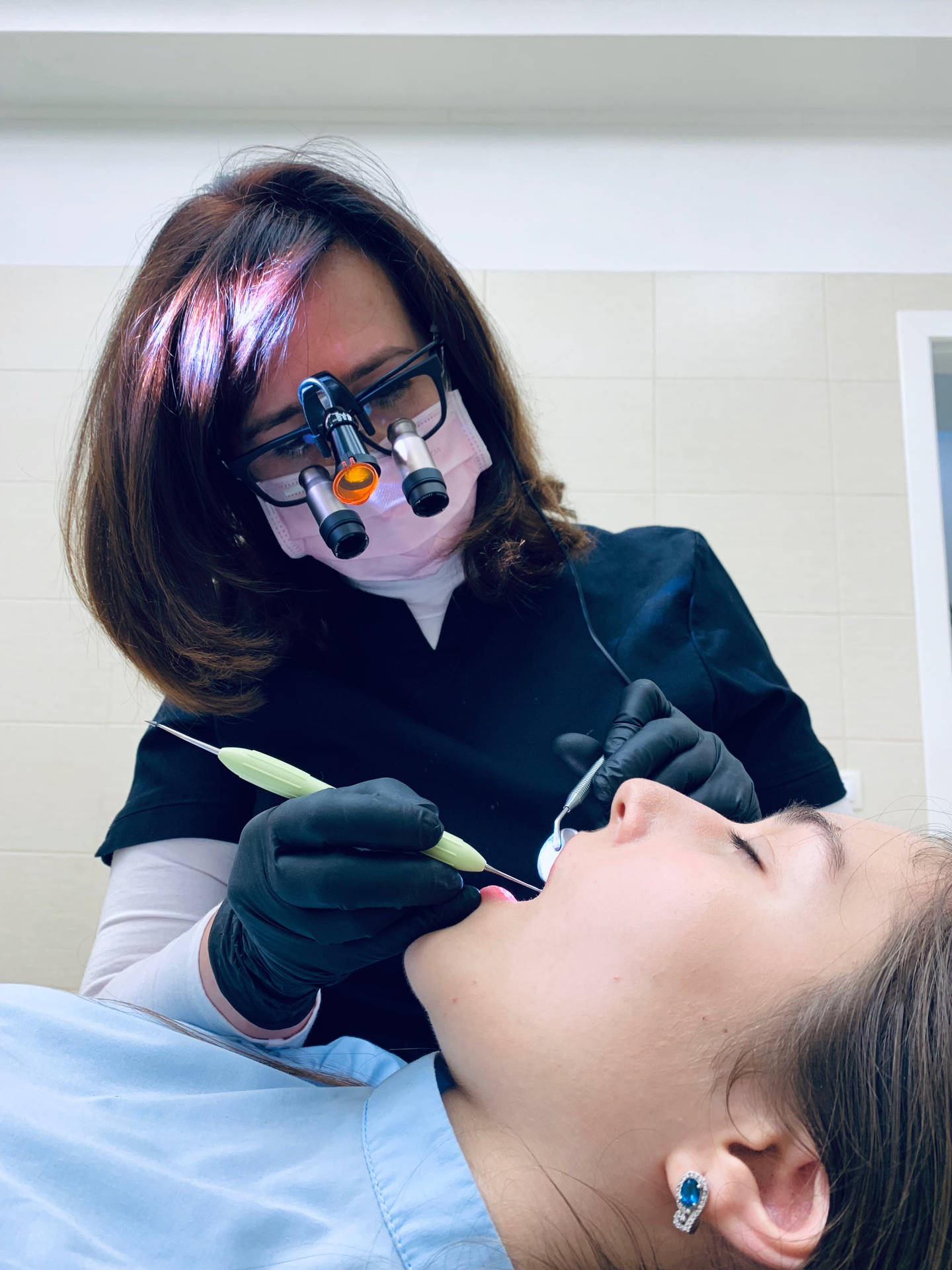 Dentist Wearing Dentistry Magnifying Glasses