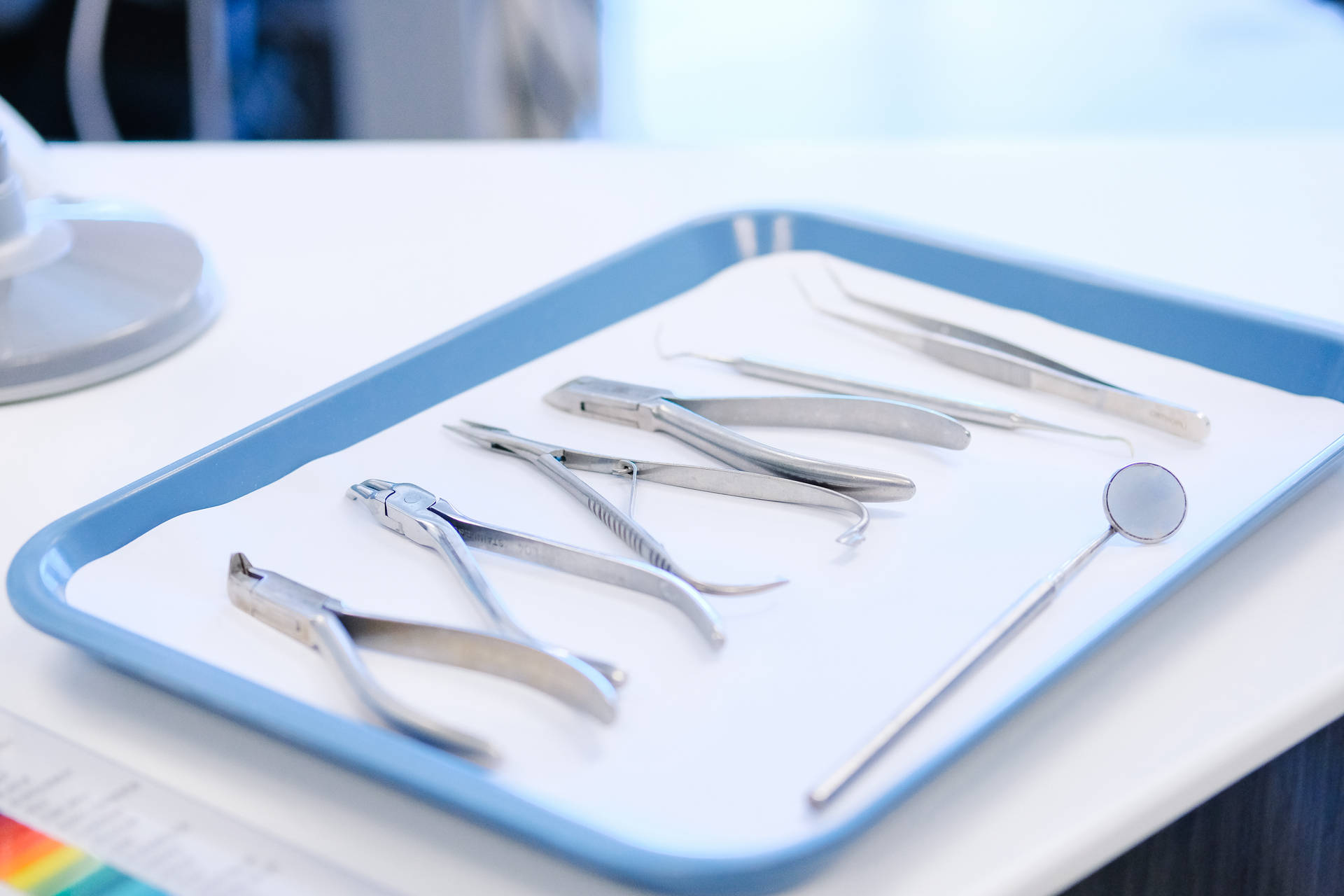 Dentistry Tools On Blue Tray Background