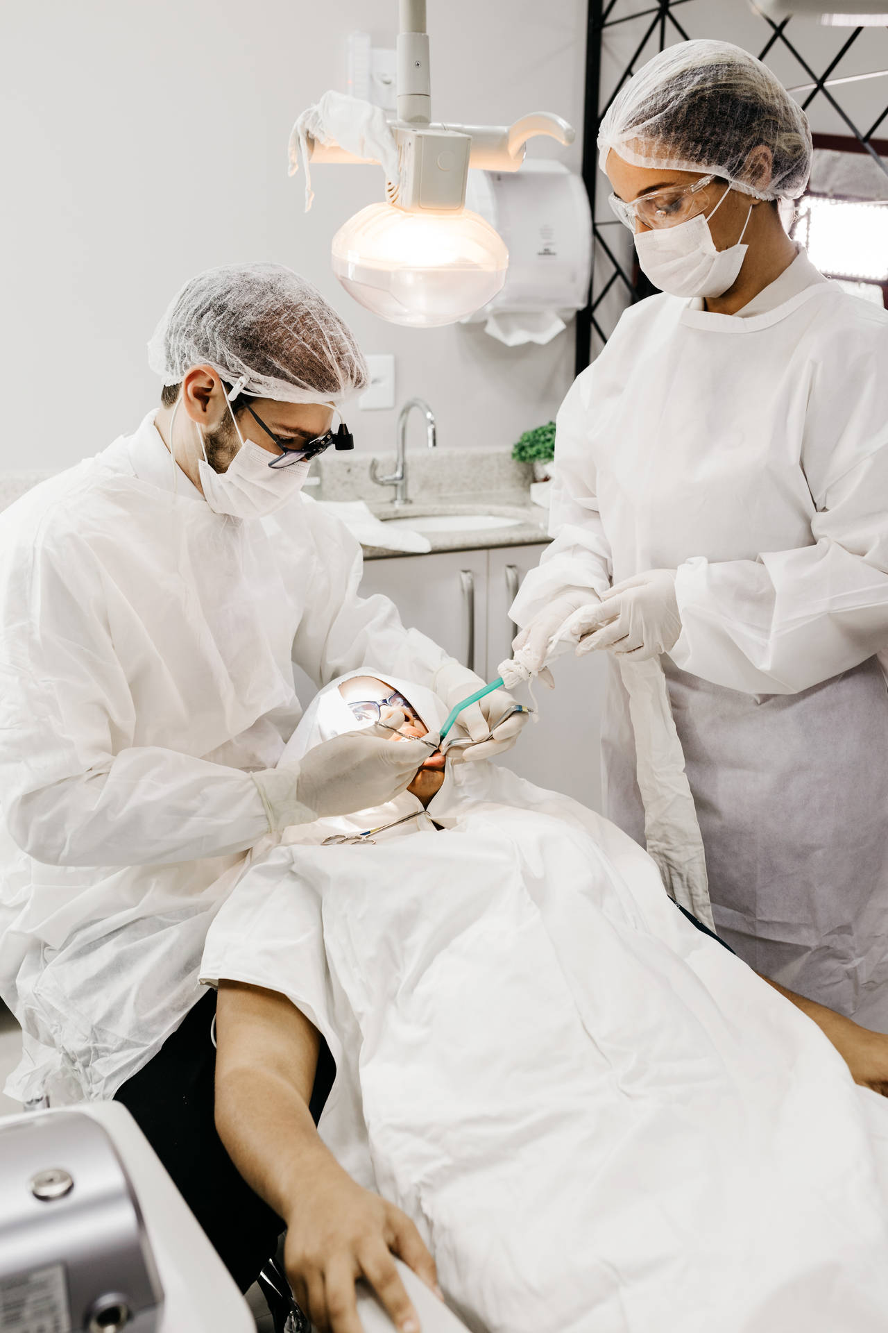 Dentists In Scrubs With Patient Dentistry