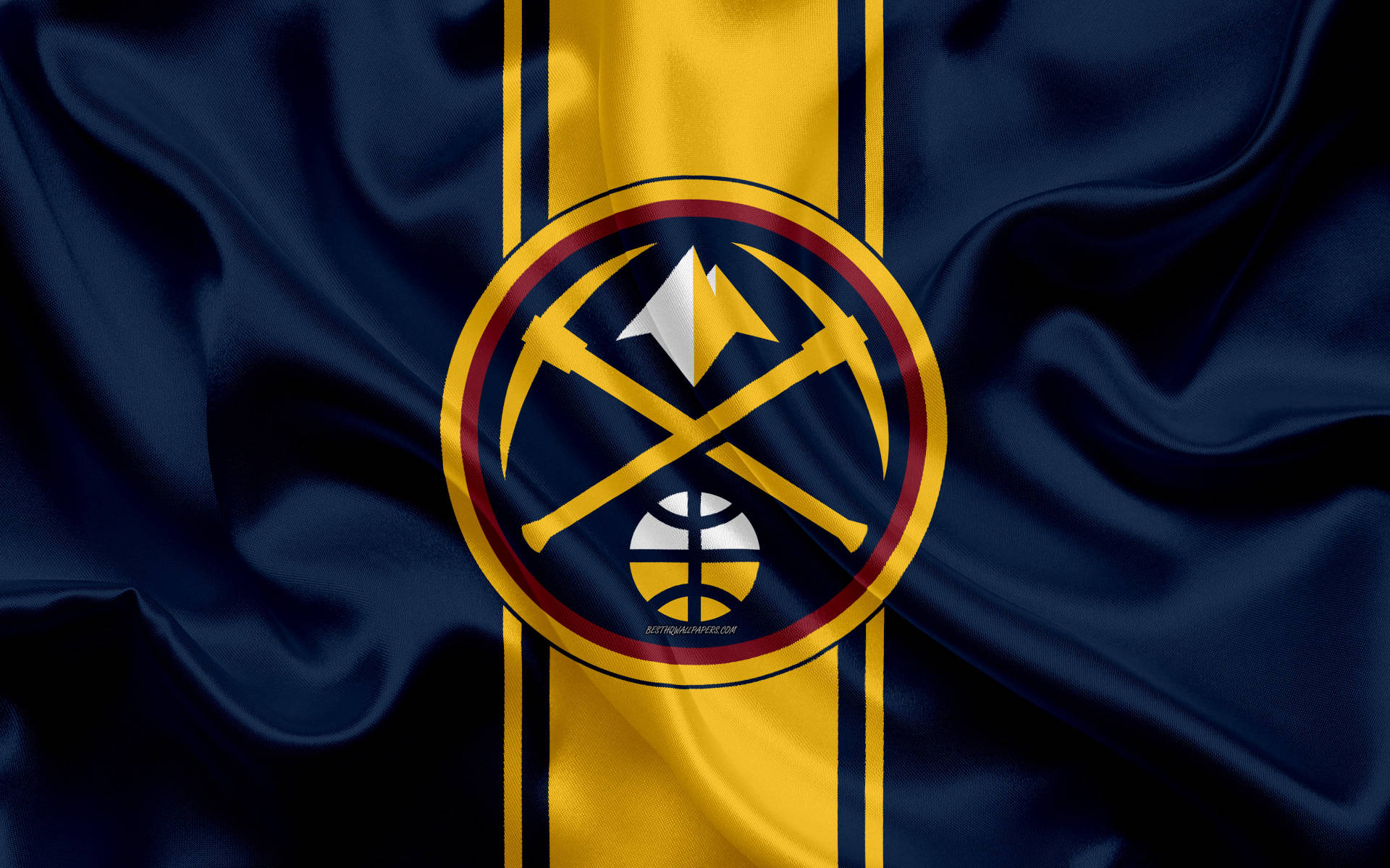 Denver Nuggets Logo On Silky Fabric Background