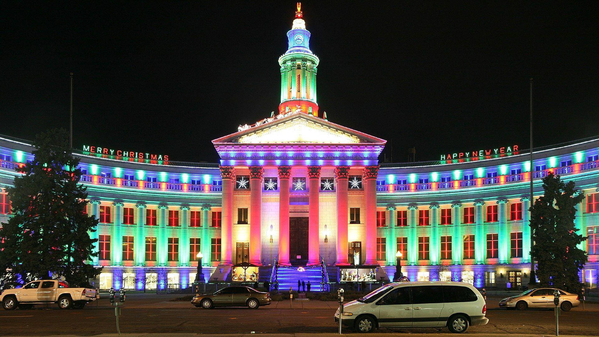 Denver's Colorful Building At Night Background