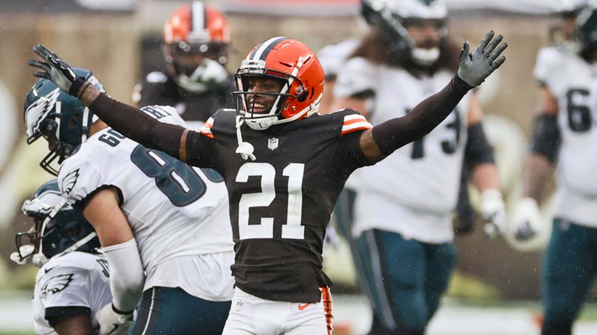 Denzel Ward Celebrating Against Philadelphia Eagles Background