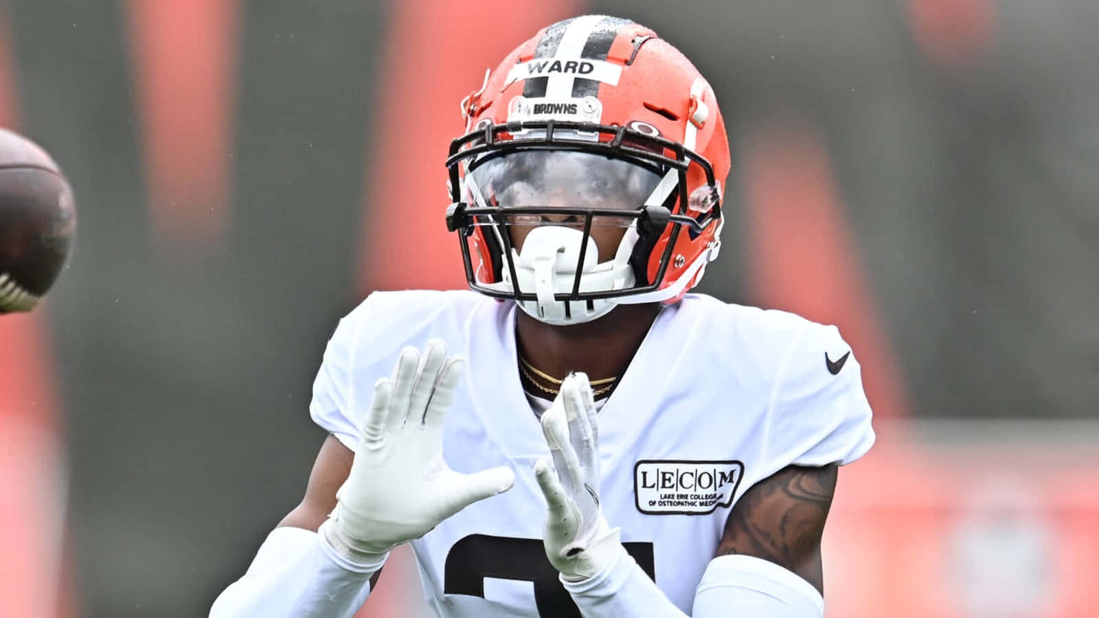Denzel Ward Cleveland Brown Catching Pass Background