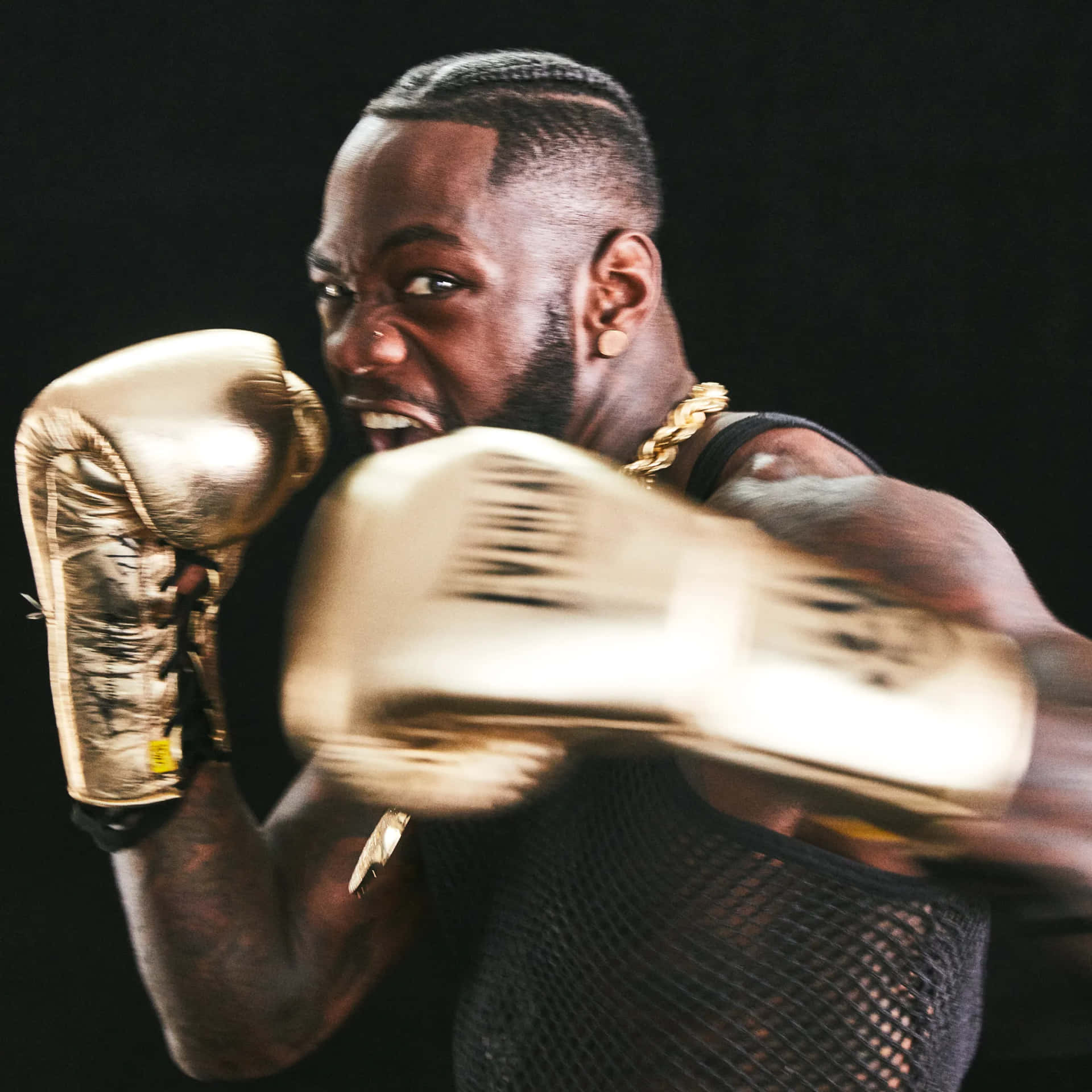 Deontay Wilder Boxing Punch Action Background