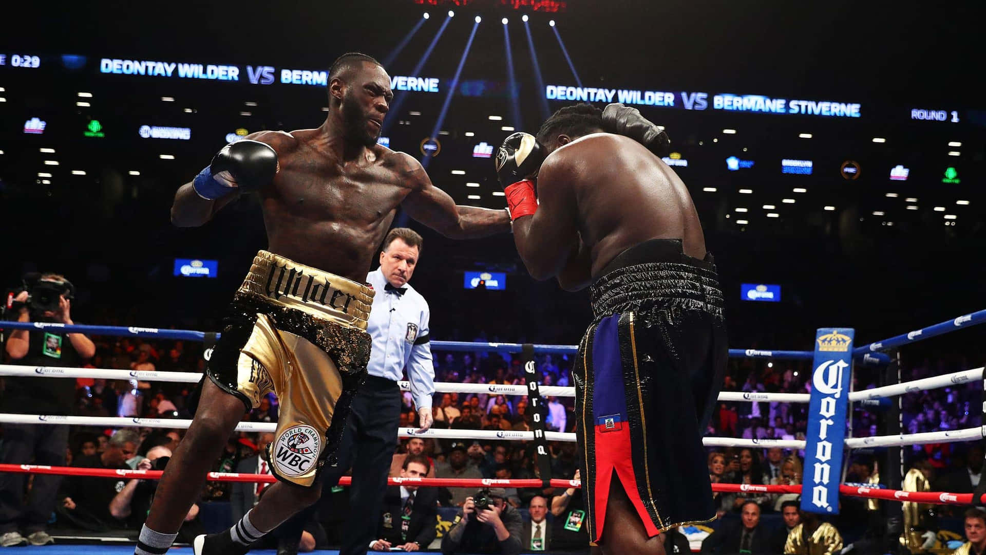 Deontay Wilder Dominating Boxing Match Background