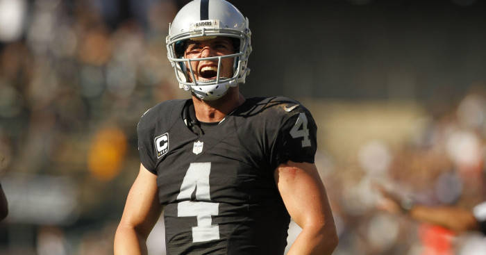 Derek Carr In Black Shouting Background