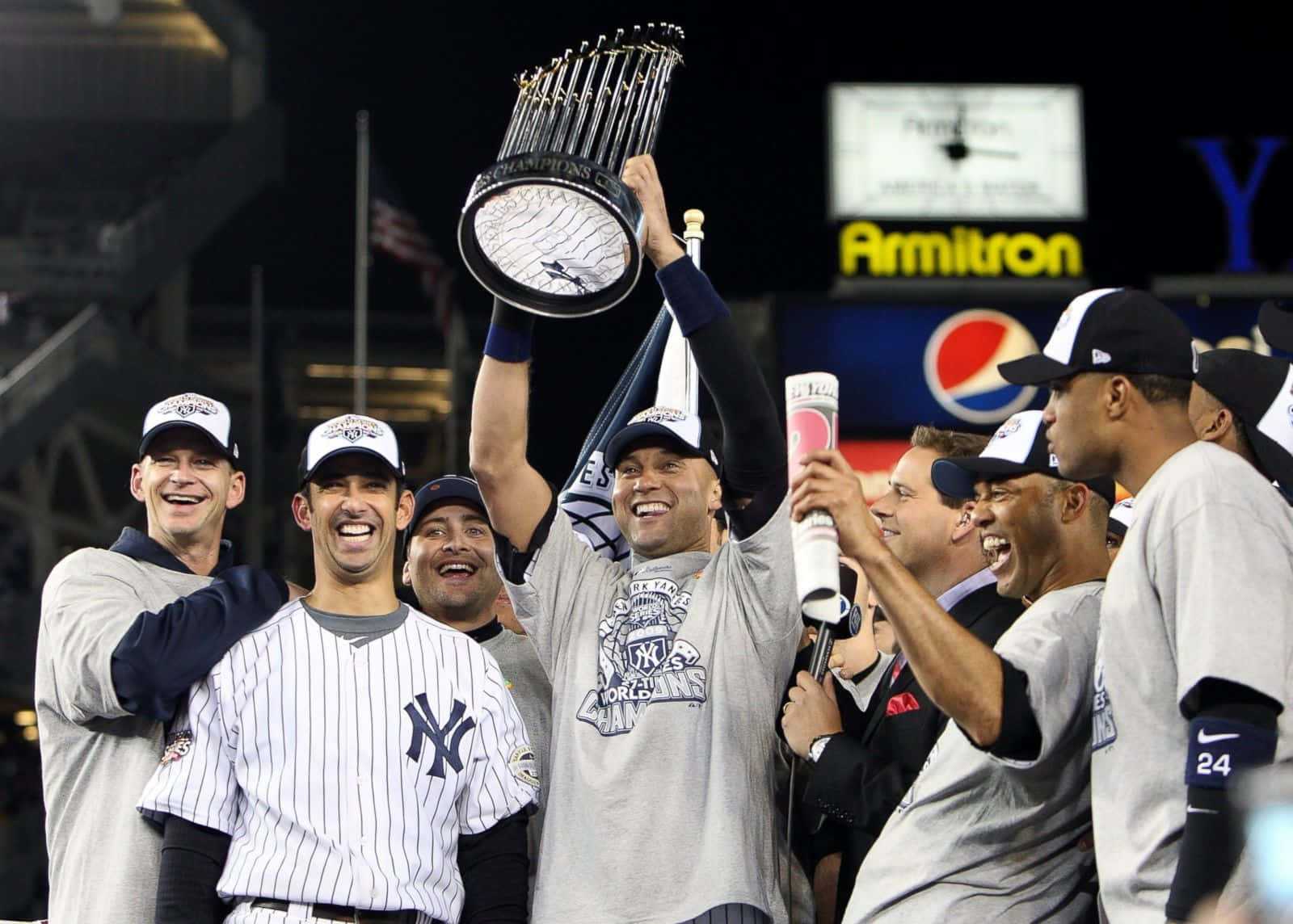 Derek Jeter Raising World Series Throphy Background