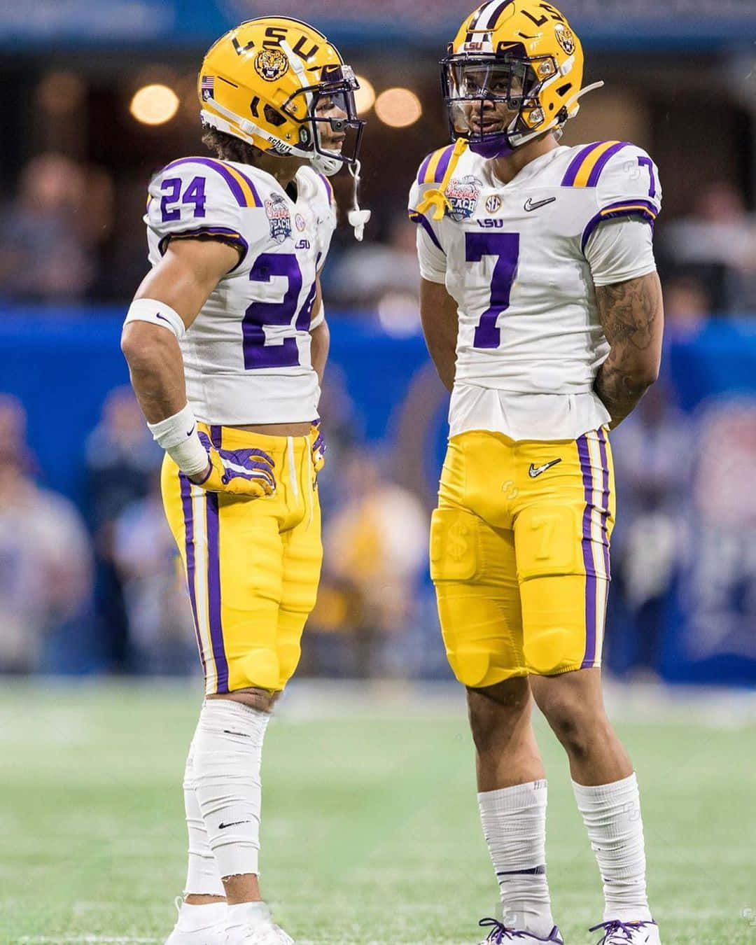 Derek Stingley Jr And Tyrann Mathieu Background