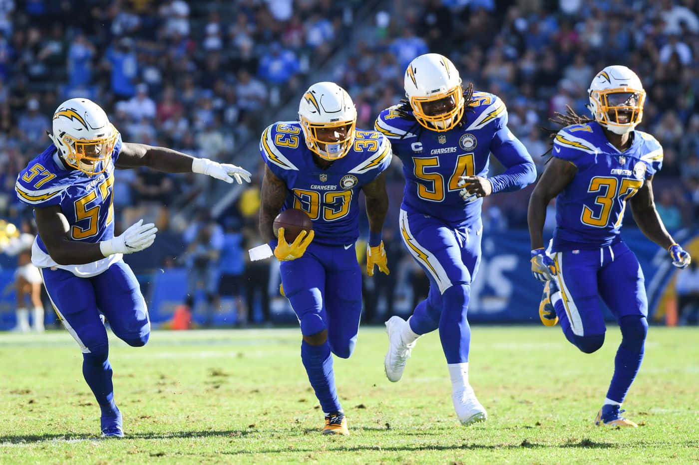Derwin James Los Angeles Chargers With Teammates Background