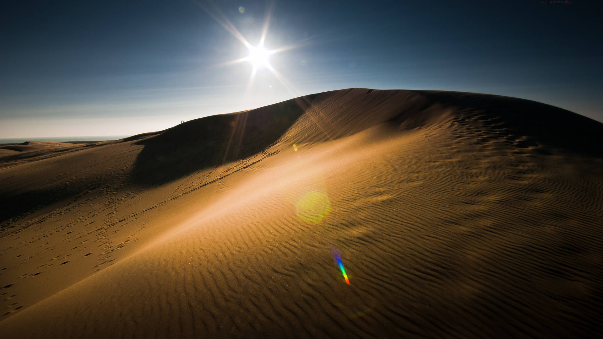 Desert Sun On Top Of Dunes Background