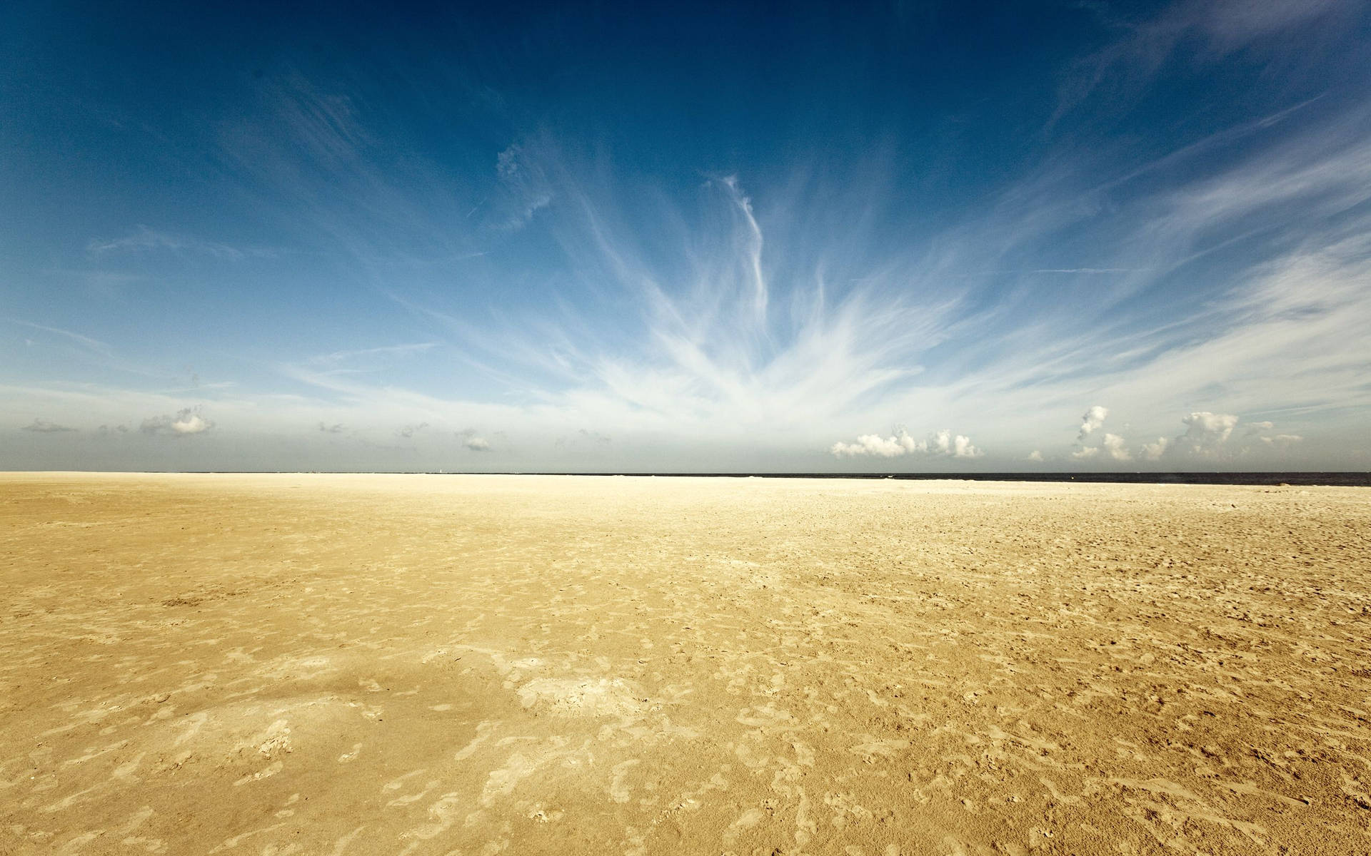 Cirrus clouds and blue sky over the white gypsum sand dune…
