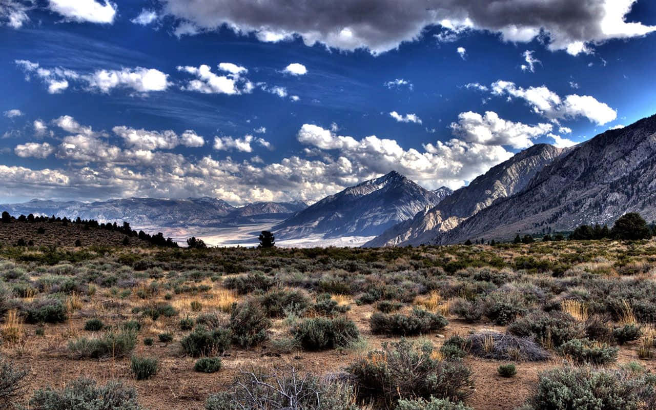 Desolate Plain Mountain Valley Background