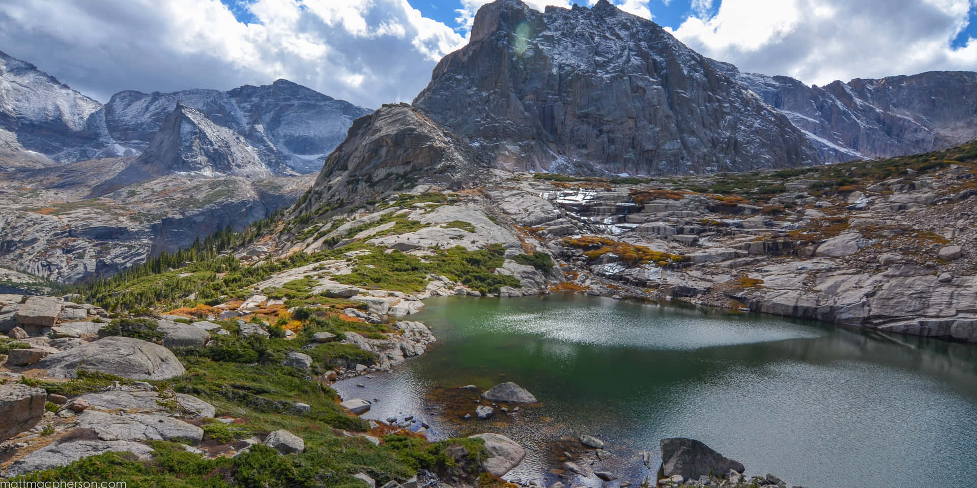 Desolate Remote Mountain Lake Background