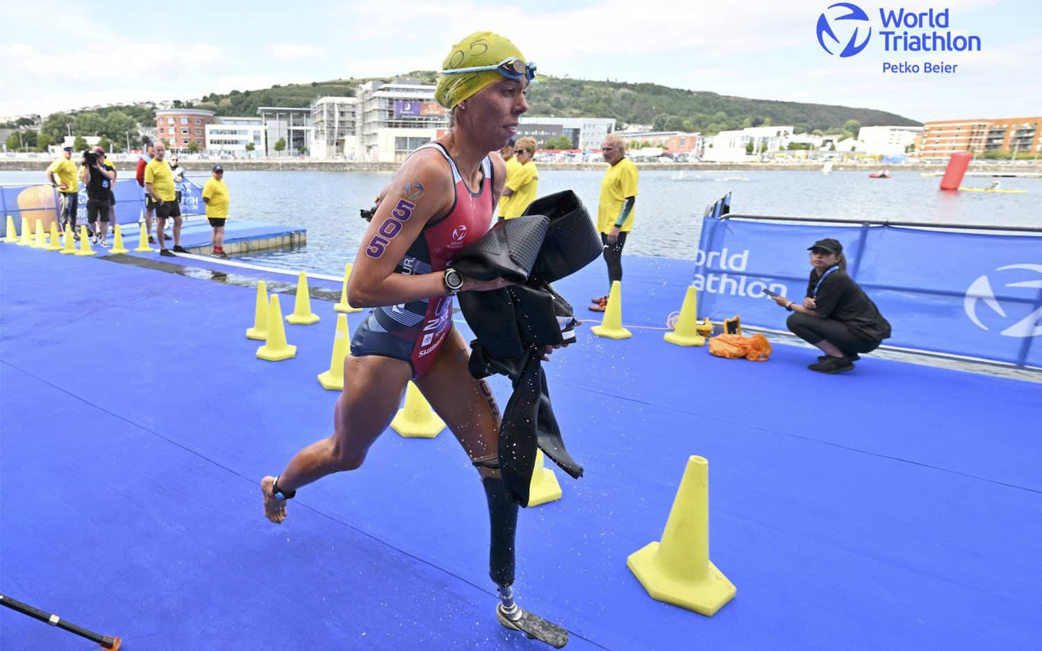 Determination Exemplified: Paralympic Triathlon Athlete In Action Background