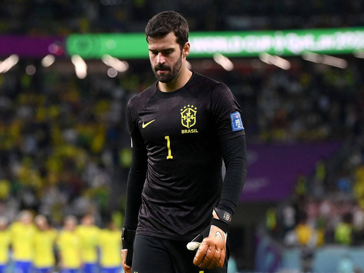 Determined Alisson Becker Steeled For Battle Background