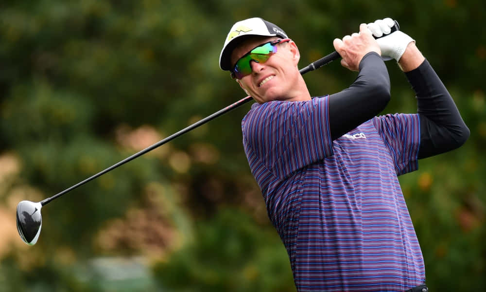 Determined John Senden In Mid-swing Background