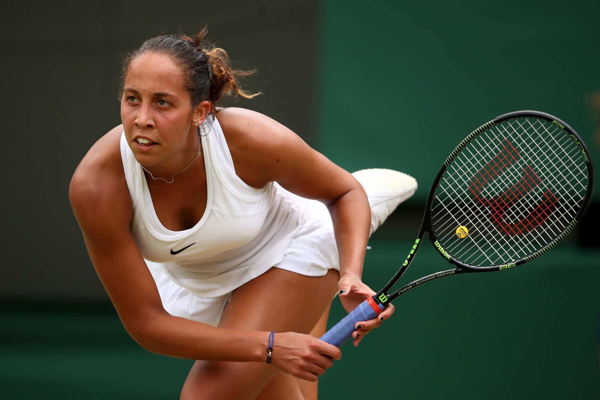 Determined Madison Keys In The Heat Of The Game Background