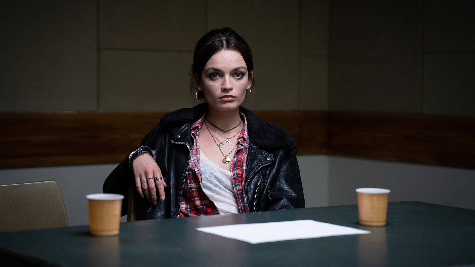 Determined Maeve Wiley In The Interrogation Room Background