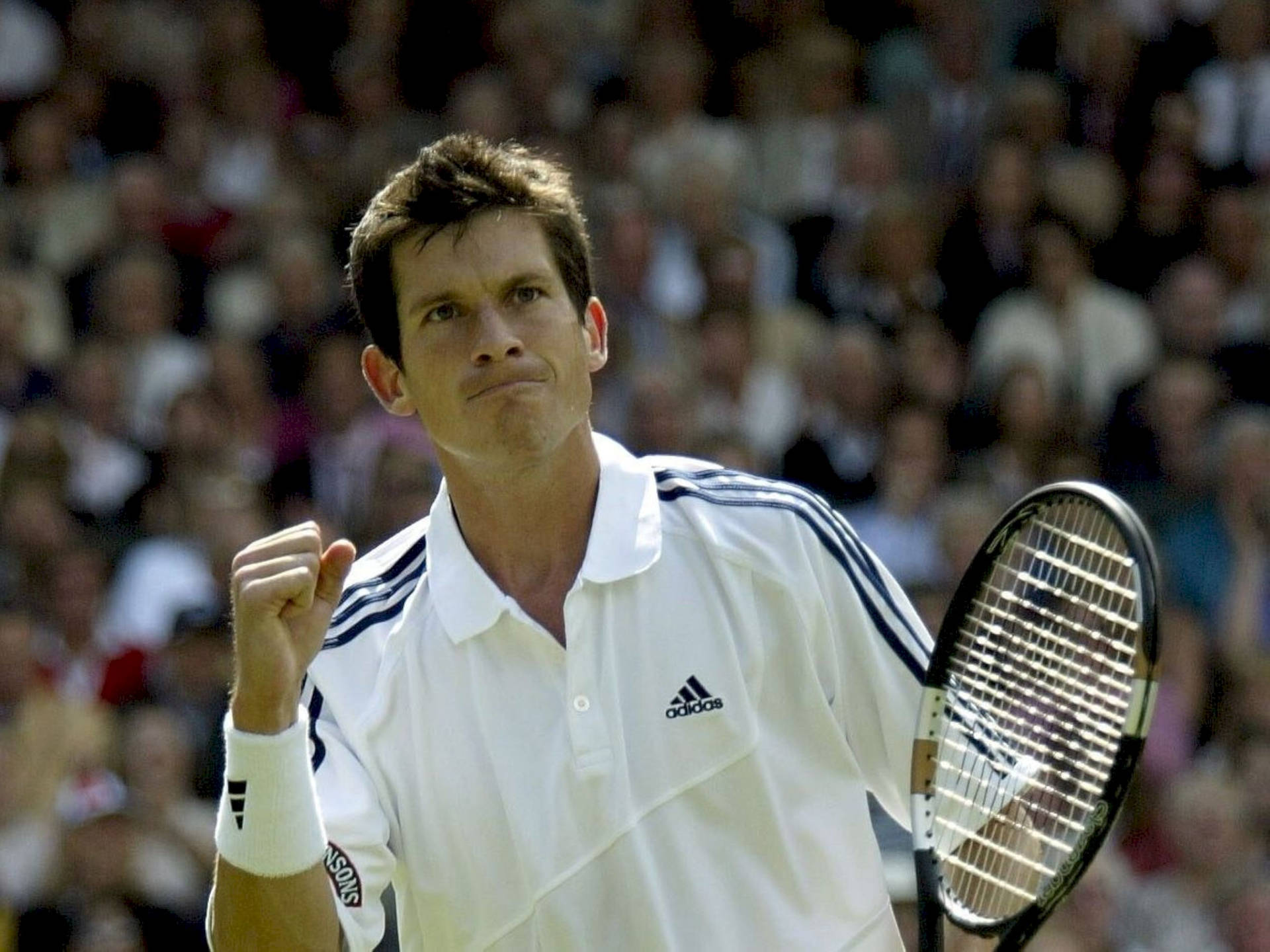 Determined Tim Henman Playing Tennis Background