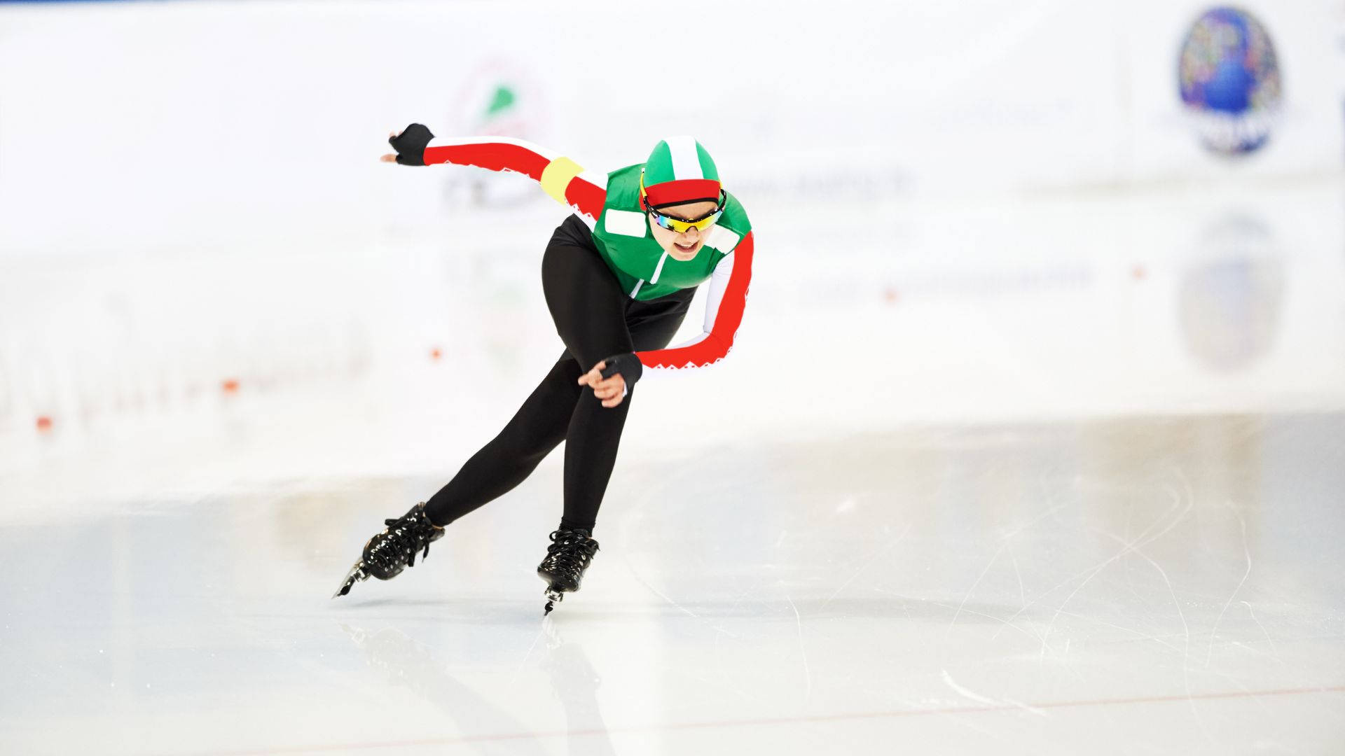 Determined Woman Speed Skating On A Frozen Path