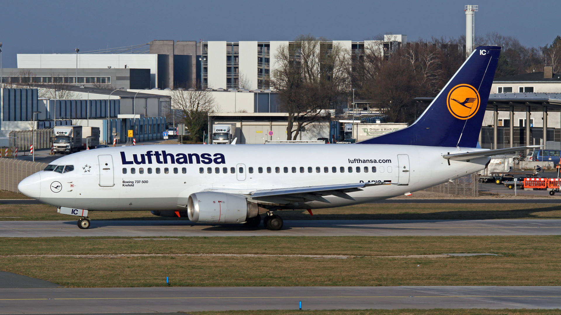 Deutsche Lufthansa Plane In Action On The Runway Background