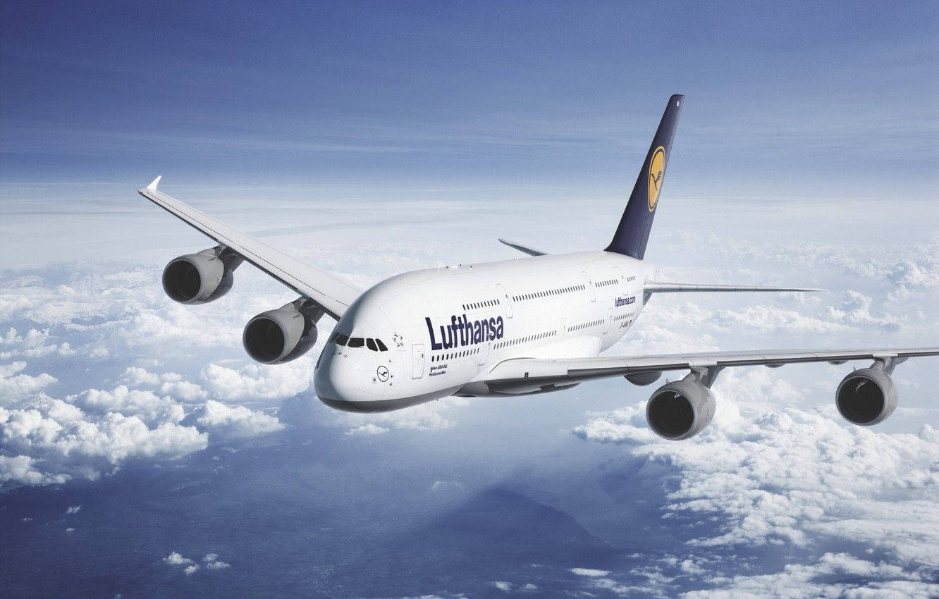 Deutsche Lufthansa Plane On The Blue Horizon Background