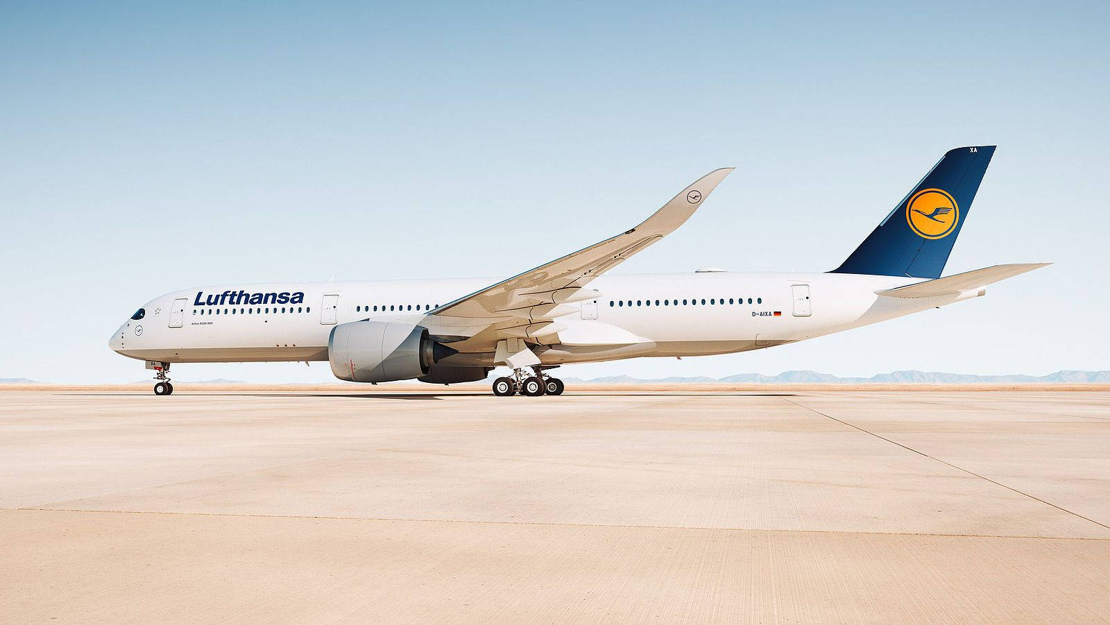 Deutsche Lufthansa Plane Under The Scorching Sun Background