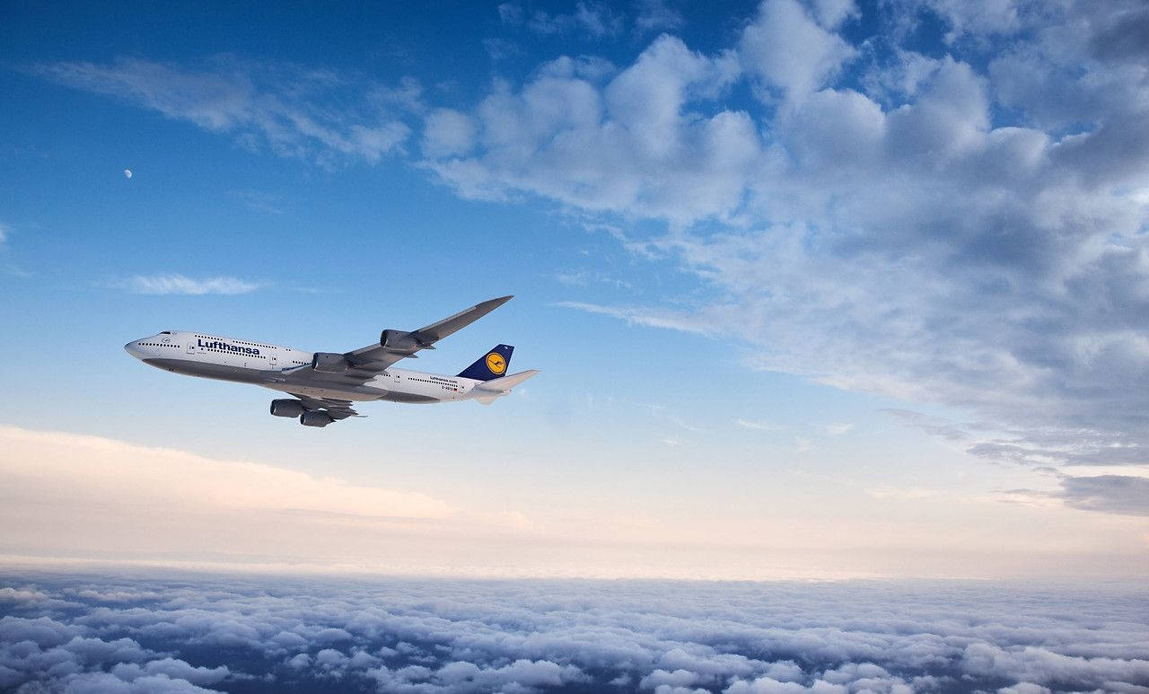 Deutsche Lufthansa Plane With A Panoramic Sky View