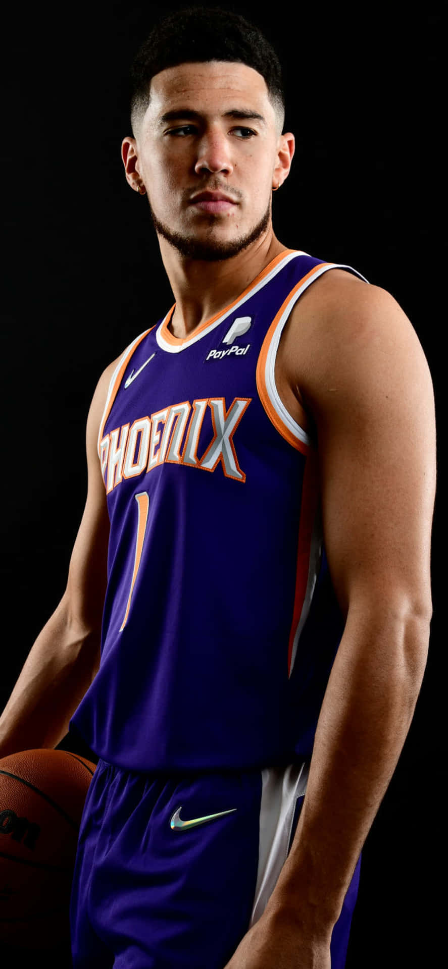 Devin Booker Shown With His Signature Iphone Background