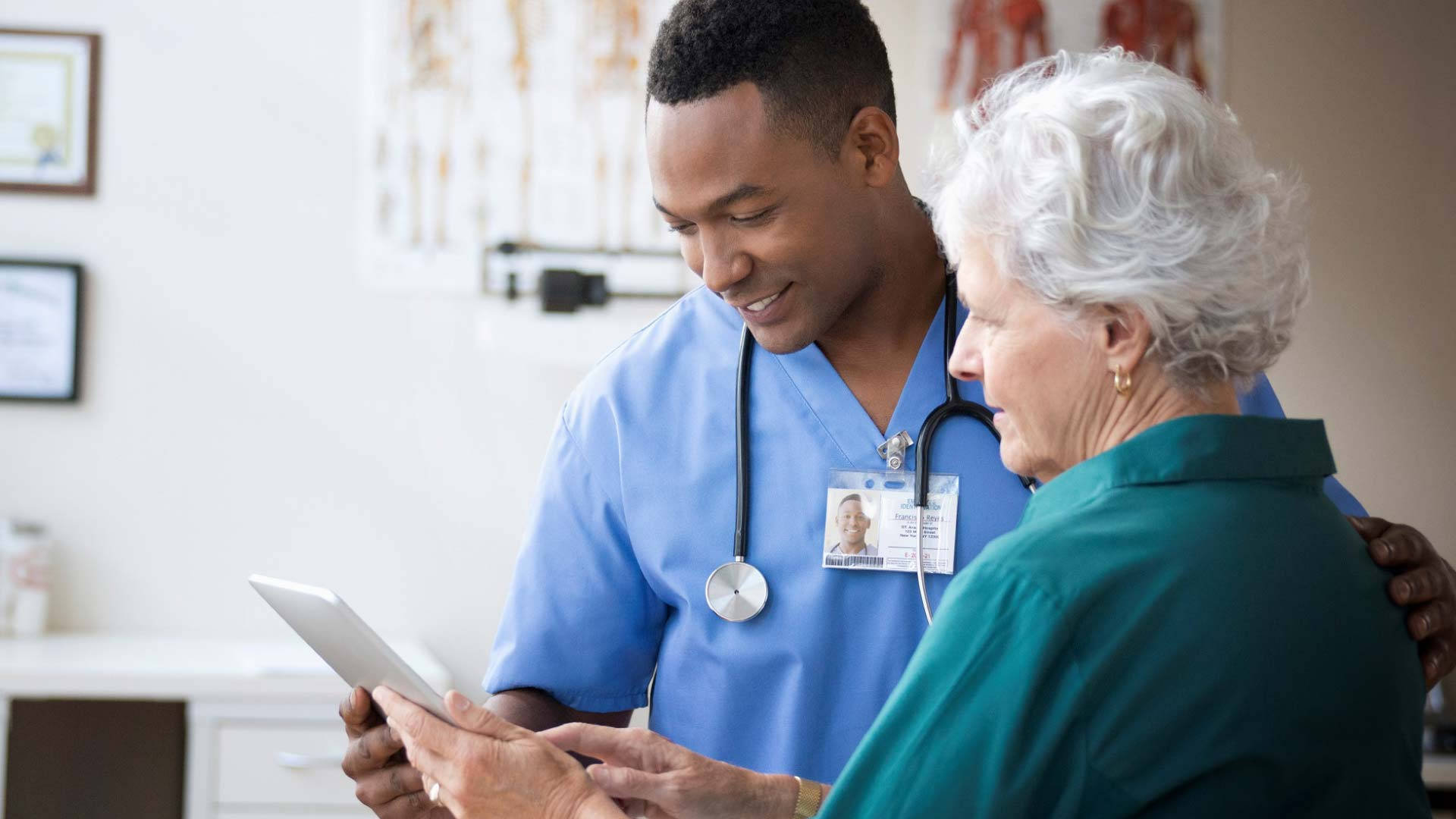 Devoted Nurse Assisting Elderly Woman Background