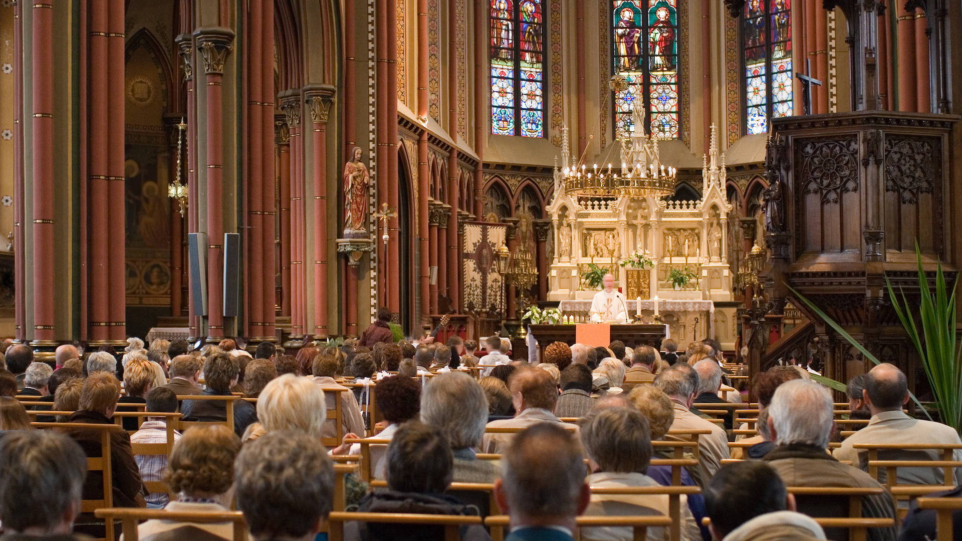 Devoted Worshippers In Holy Eucharist Celebration