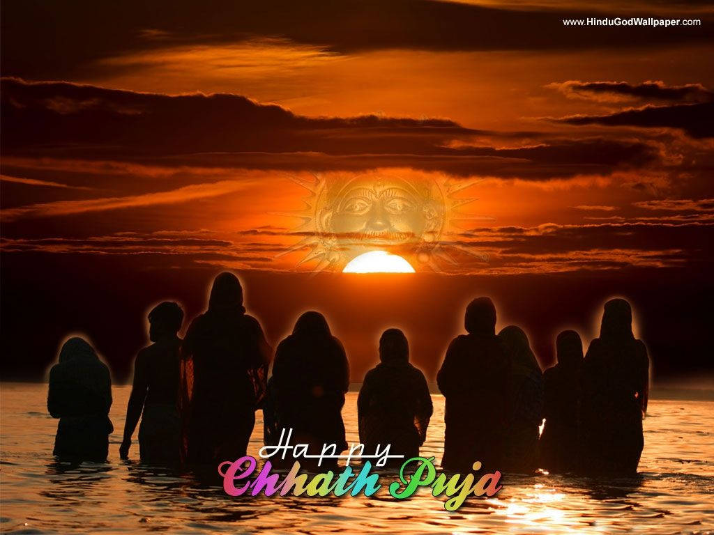 Devotees Celebrating Chhath Puja At Sunset Background