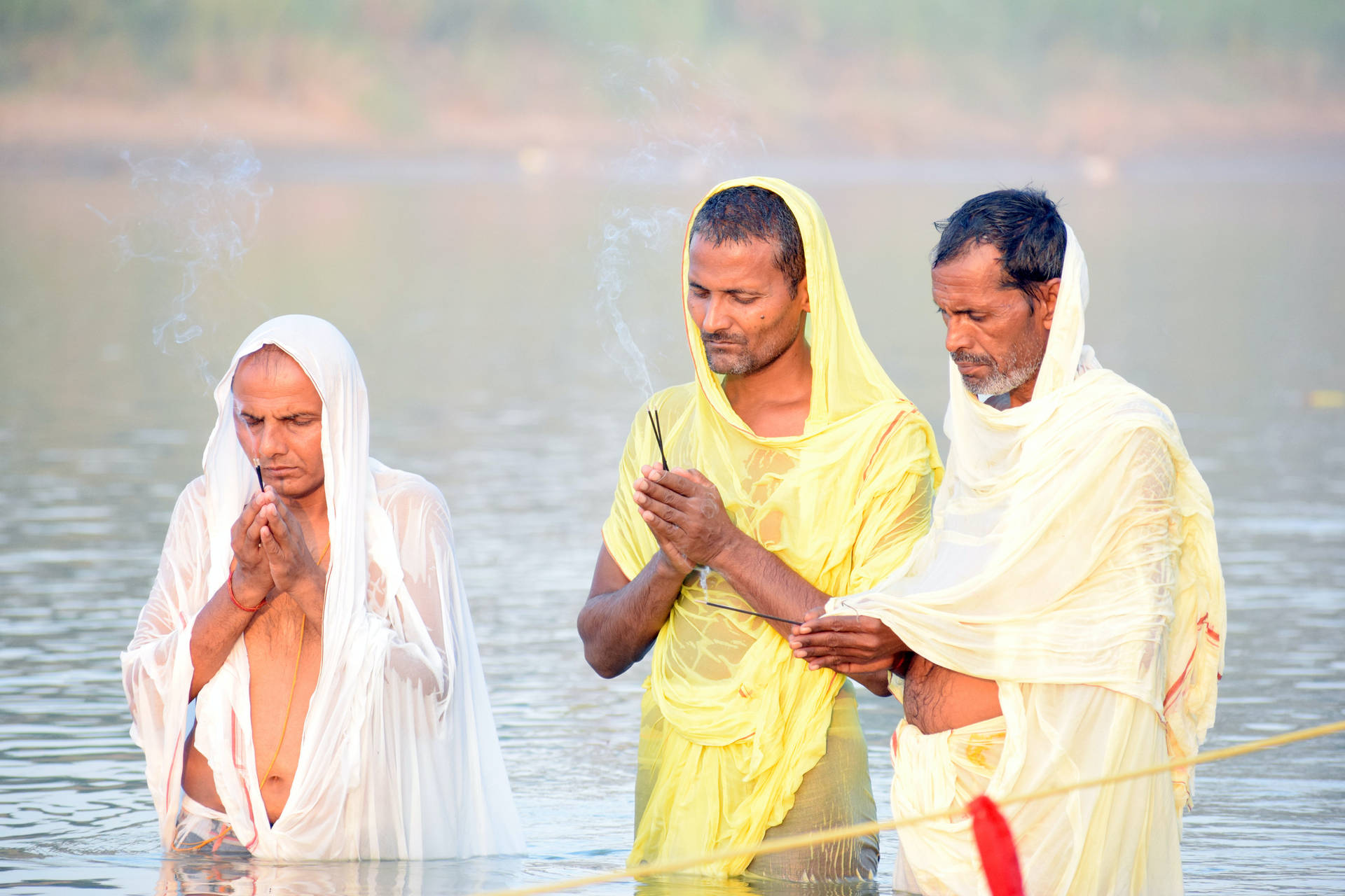 Devotees Engaged In Prayer During Chhath Puja