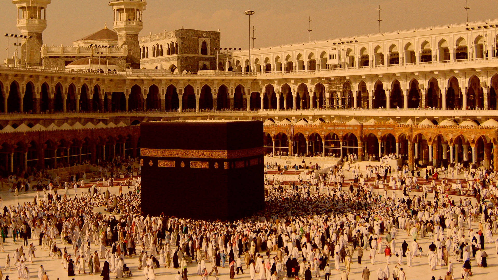 Devout Muslims Engaged In Prayer At The Sacred Kaaba