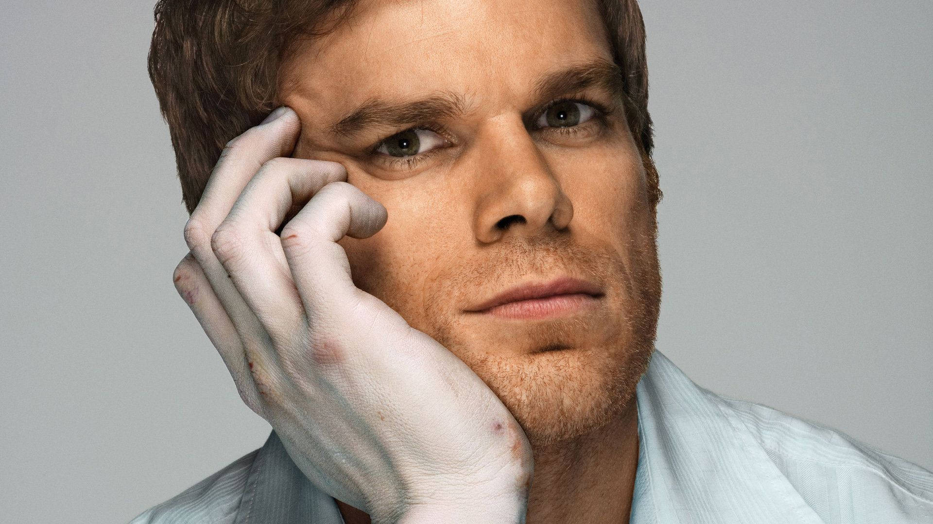 Dexter Morgan Face On White Hand Background