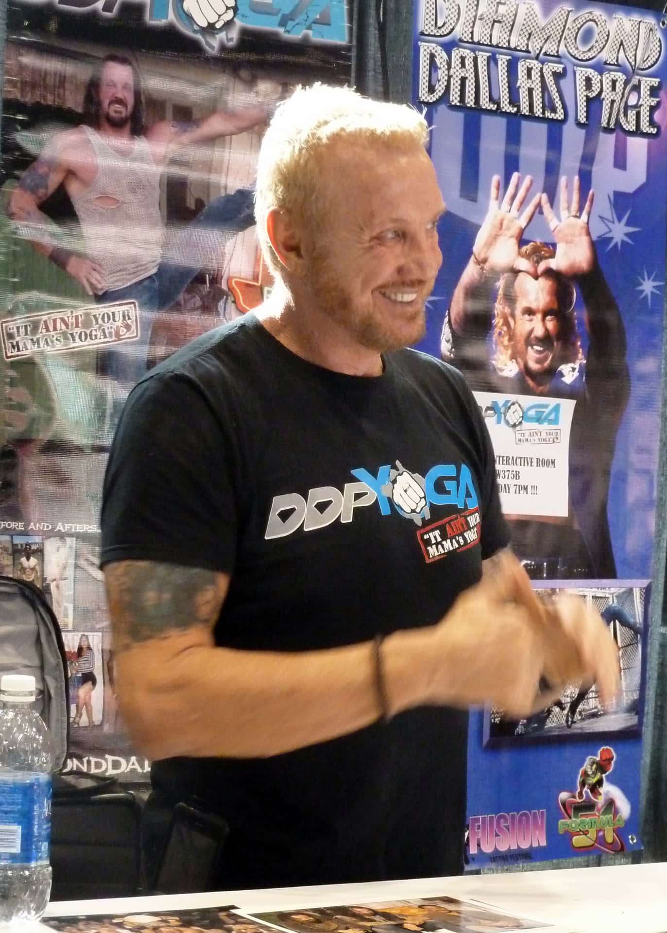 Diamond Dallas Page Signing Booth Candid Photo Background
