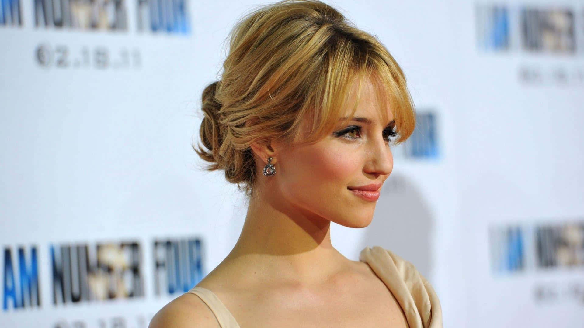 Dianna Agron Striking A Pose In A Classy Ensemble Background