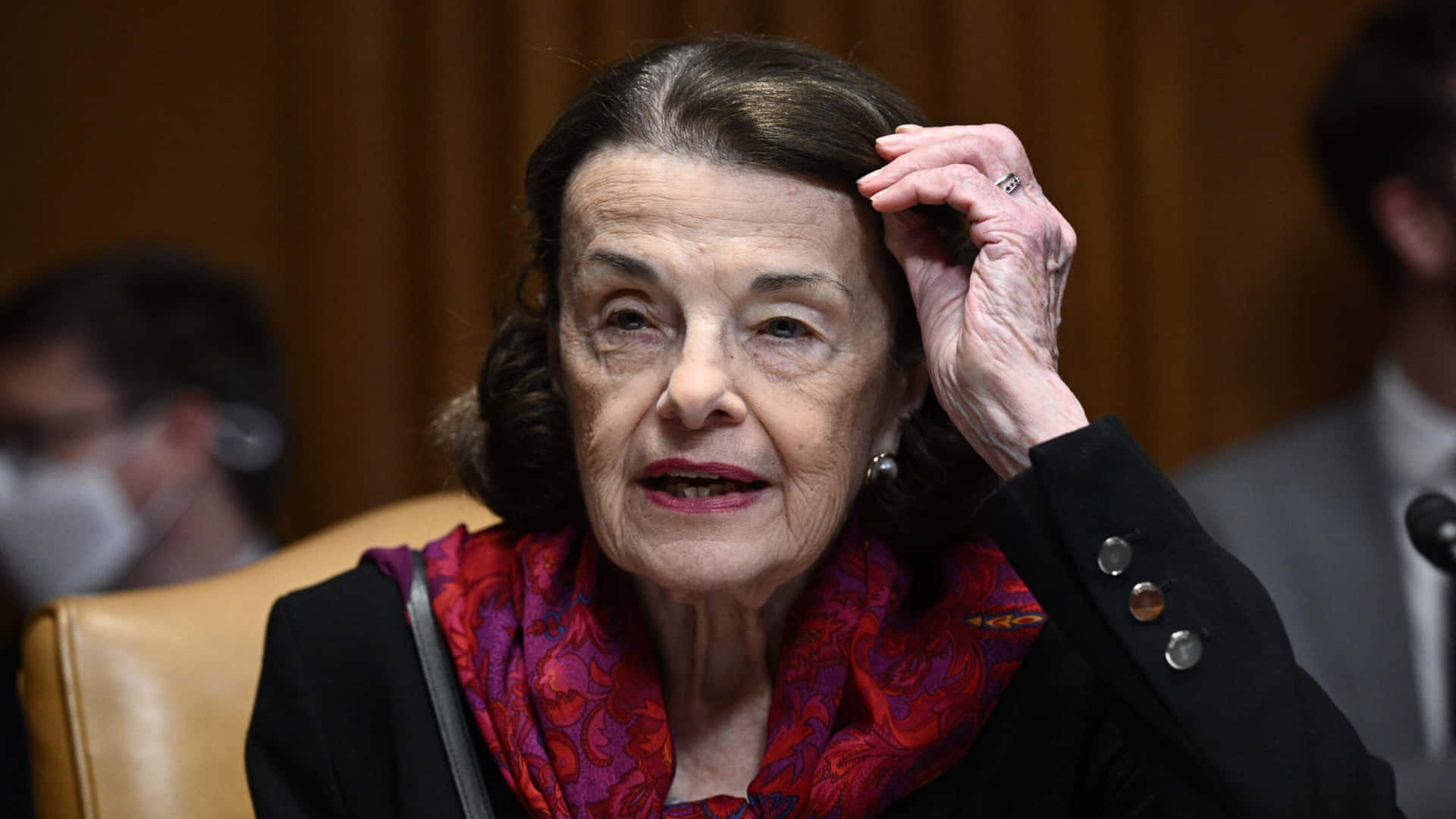 Dianne Feinstein Fixing Her Hair Background
