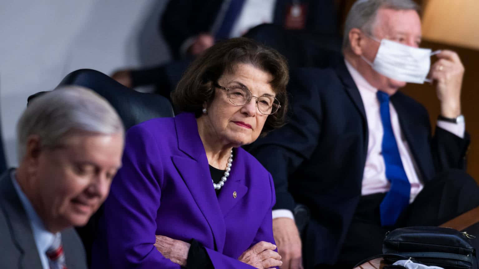 Dianne Feinstein In Purple Suit Background