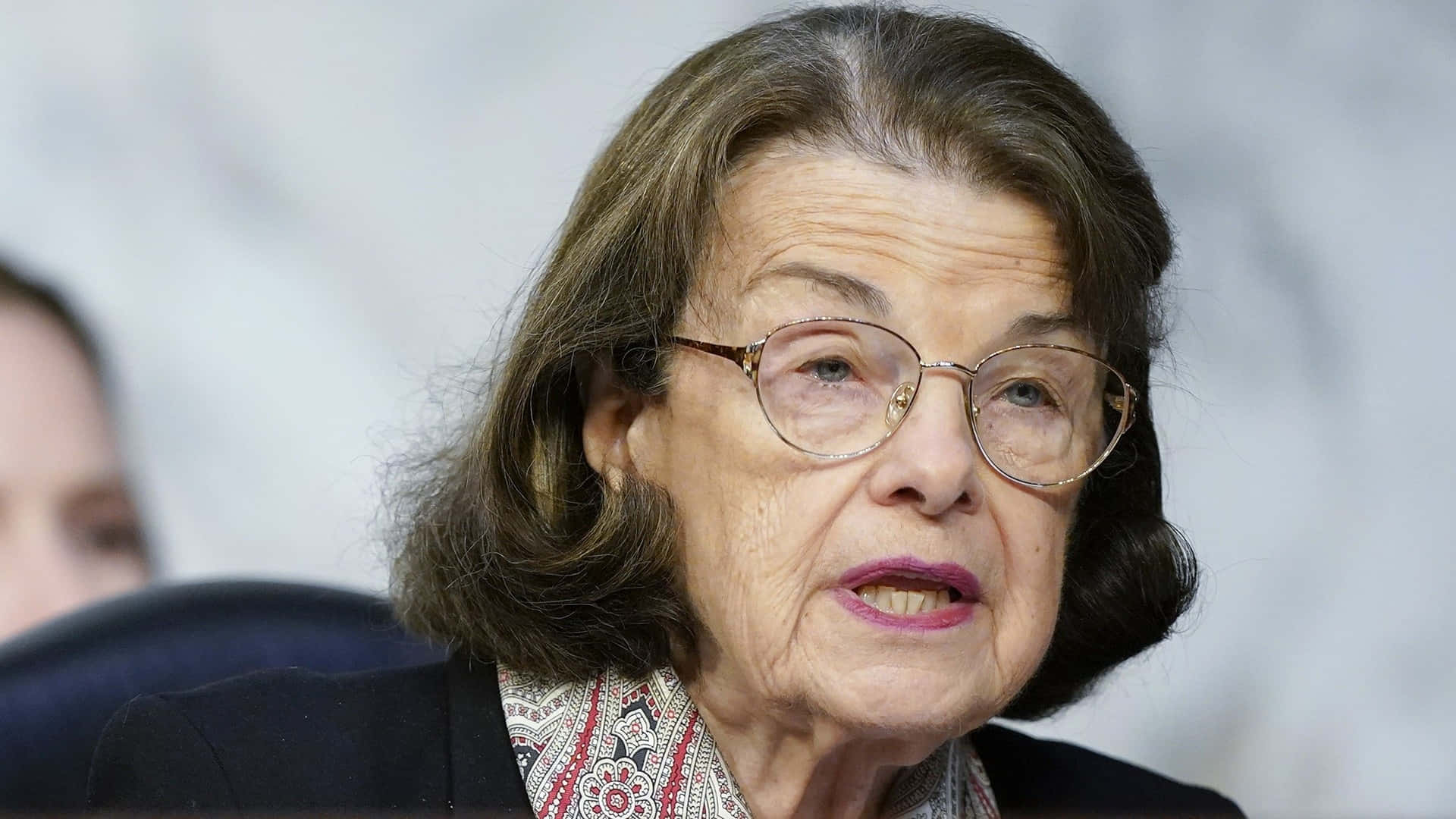 Dianne Feinstein Squinting As She Speaks Background